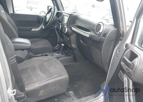 2015 Jeep Wrangler Unlimited Sahara z USA, uszkodzony, nr VIN 1C4BJWEG2FL610956